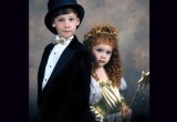 A brother and sister dress up for a portrait